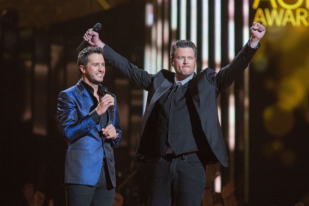 ARLINGTON, TX - APRIL 19: Co-hosts Luke Bryan (L) and Blake Shelton speak onstage during the 50th Academy of Country Music Awards at AT&T Stadium on April 19, 2015 in Arlington, Texas.