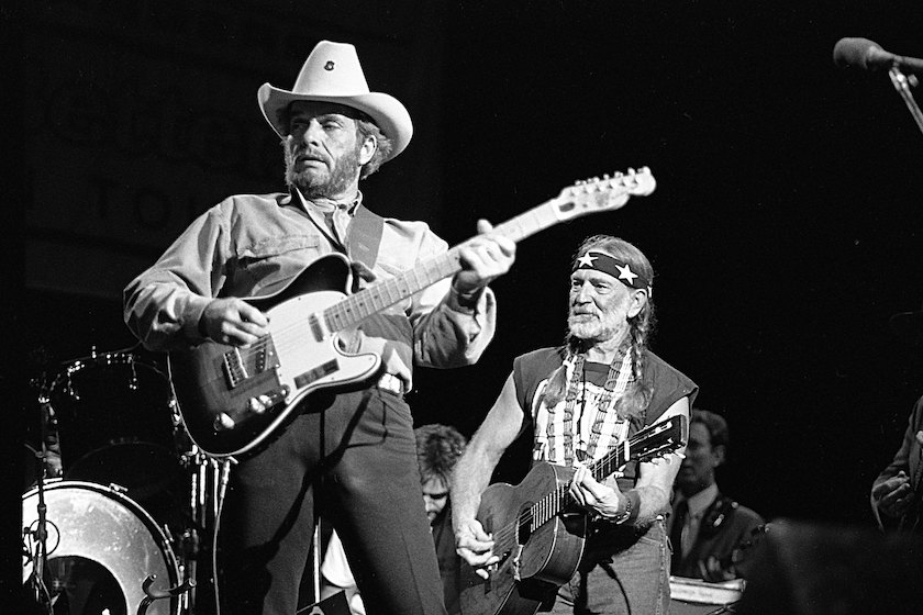 Country musician Merle Haggard performs with a Fender Telecaster with Willie Nelson in August 26, 1988. 