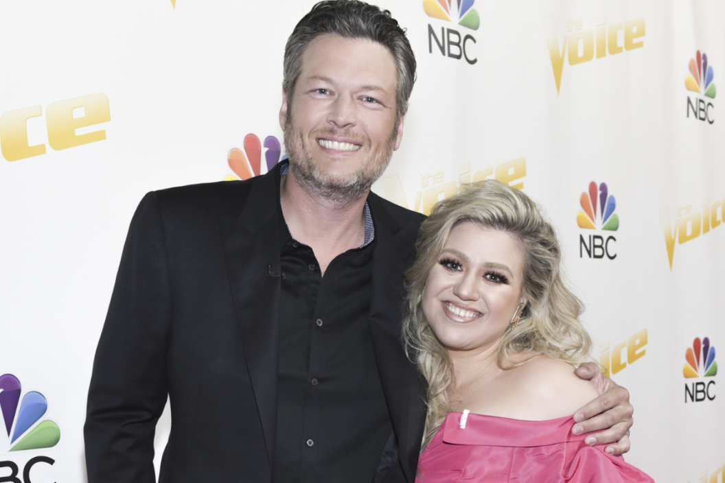 Singers/coaches Blake Shelton (L) and Kelly Clarkson attend NBC's "The Voice" Season 14 on April 30, 2018 in Universal City, California.