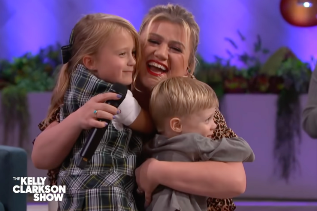 Kelly Clarkson hugs daughter River and son Remy during The Kelly Clarkson Show