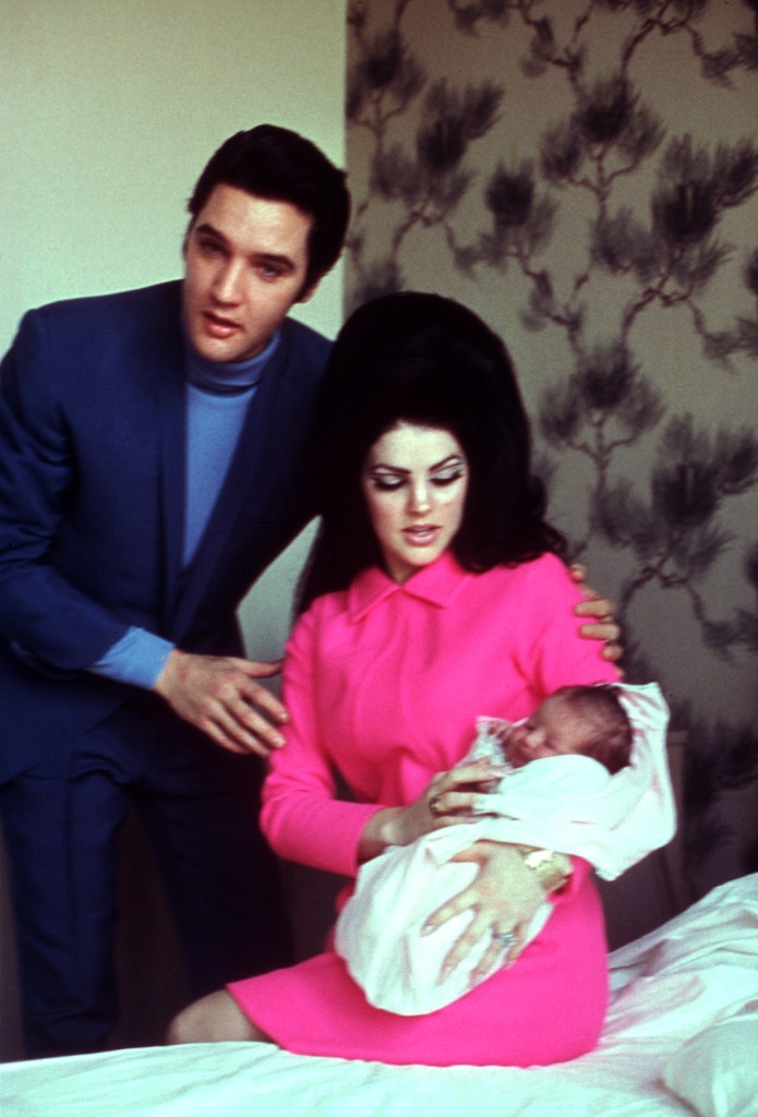 MEMPHIS, TN - FEBRUARY 1: Rock and roll singer Elvis Presley with his wife Patricia Beaulieu Presley and their newborn daughter Lisa Marie Presley February 1, 1968 in Memphis, Tennessee. 