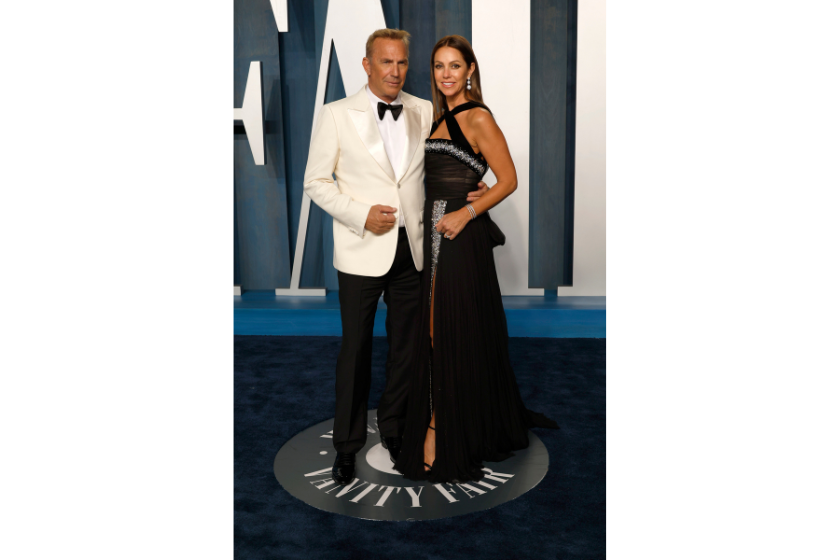 Kevin Costner and Christine Baumgartner attend the 2022 Vanity Fair Oscar Party