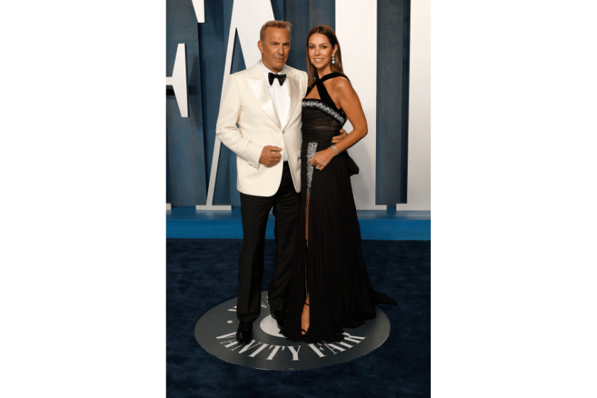 Kevin Costner and Christine Baumgartner attend the 2022 Vanity Fair Oscar Party