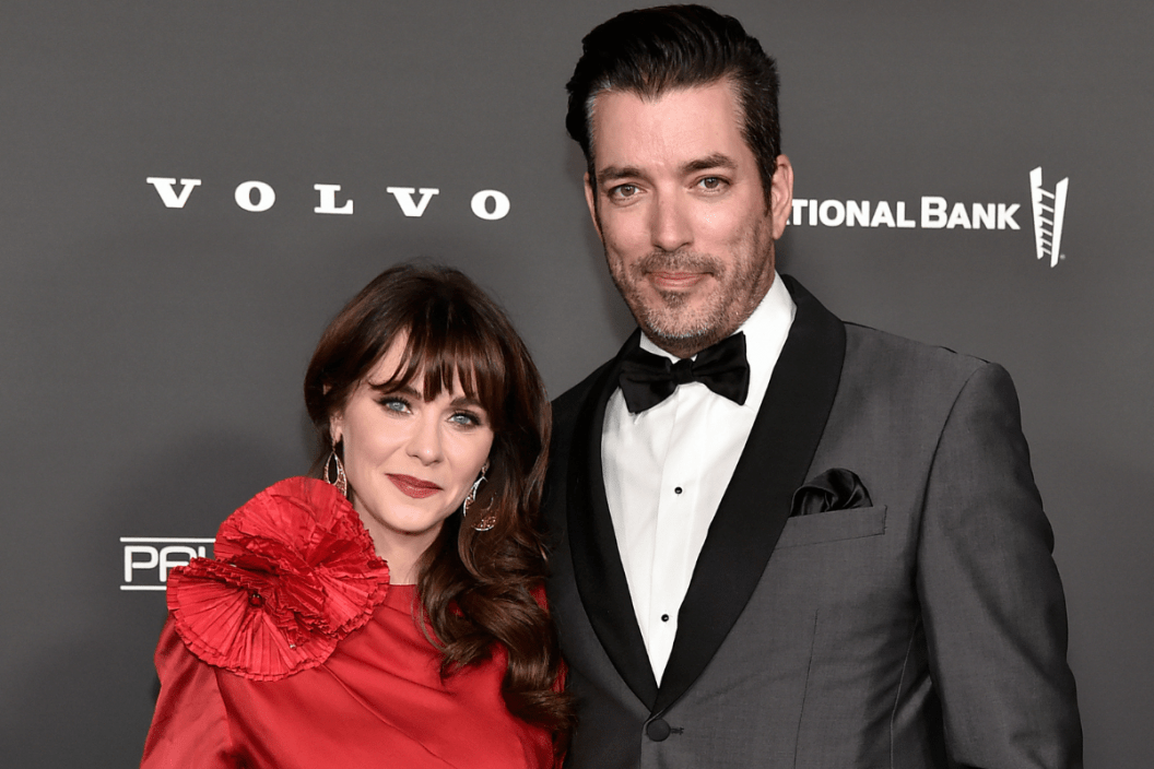 WEST HOLLYWOOD, CALIFORNIA - NOVEMBER 12: (L-R) Zooey Deschanel and Jonathan Scott attend the 2022 Baby2Baby Gala presented by Paul Mitchell at Pacific Design Center on November 12, 2022 in West Hollywood, California.