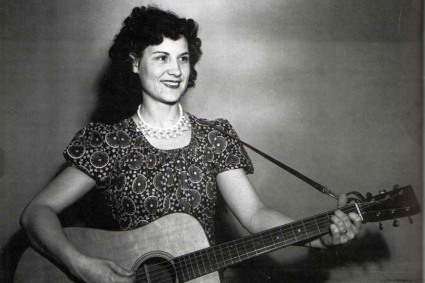 UNSPECIFIED - circa 1950: (AUSTRALIA OUT) Photo of American country singer and guitarist Kitty Wells (1919-2012) posed with acoustic guitar circa 1950. 