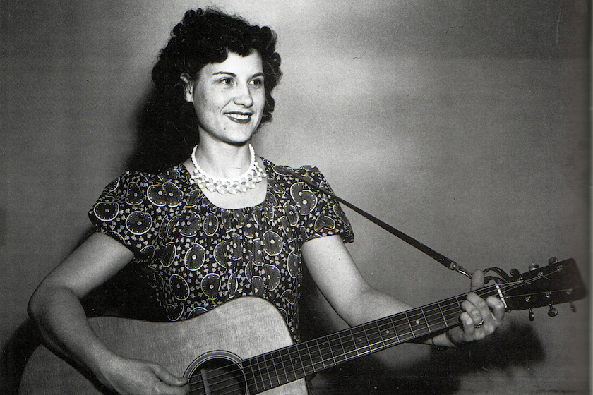 UNSPECIFIED - circa 1950: (AUSTRALIA OUT) Photo of American country singer and guitarist Kitty Wells (1919-2012) posed with acoustic guitar circa 1950.