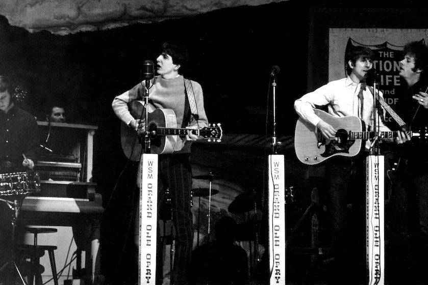 NASHVILLE, TN - CIRCA 1968: Folk-Rock Group "The Byrds" perform at the Grand Ol' Opry in Nashville, Tennessee circa 1968. Left to right: Kevin Kelly, Gram Parsons, Jim (Roger) McGuinn and Chris Hillman.
