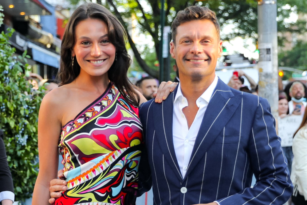 Aubrey Paige and Ryan Seacrest are seen outside 'Halftime' Premiere at the United Palace Theater on June 08, 2022 in New York City.