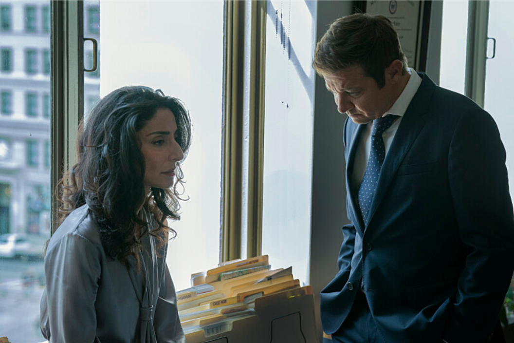 MAYOR OF KINGSTOWN: “Drones”- Necar Zadegan as Evelyn Foley and Jeremy Renner as Mike McLusky in season 2, episode 7 of the Paramount+ series MAYOR OF KINGSTOWN. Photo Cr: Dennis P. Mong Jr./Paramount + © 2022 Viacom International Inc. All Rights Reserved.