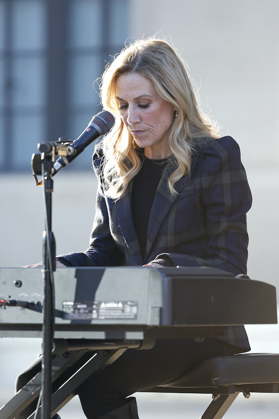 NASHVILLE, TENNESSEE - MARCH 29: Singer & songwriter Sheryl Crow performs at a candlelight vigil to mourn and honor the lives of the victims, survivors and families of The Covenant School on March 29, 2023 in Nashville, Tennessee. 