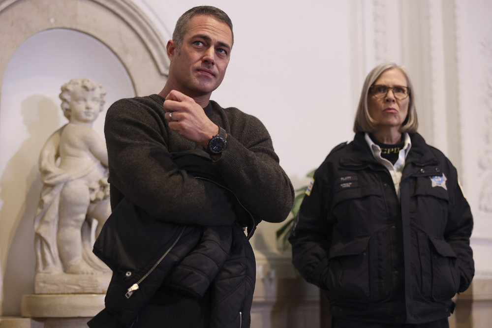 CHICAGO FIRE — "Run Like Hell" Episode 1114 — Pictured: (l-r) Taylor Kinney as Kelly Severide, Amy Morton as Trudy —