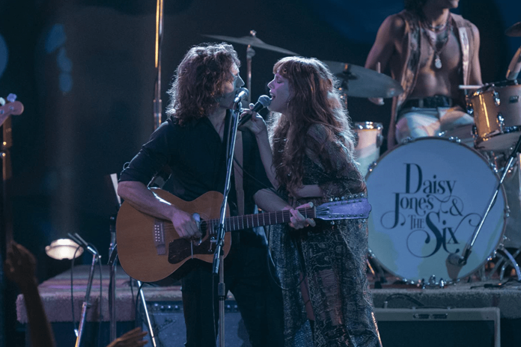 Riley Keough and Sam Claflin in Daisy Jones & The Six (2023)