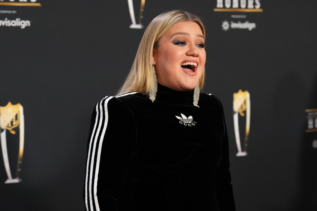 Kelly Clarkson poses for a photo on the red carpet during NFL Honors at the Symphony Hall on February 9, 2023 in Phoenix, Arizona.