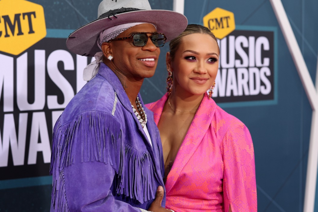 Jimmie Allen and Alexis Gale attend the 2022 CMT Music Awards at Nashville Municipal Auditorium on April 11, 2022 in Nashville, Tennessee.