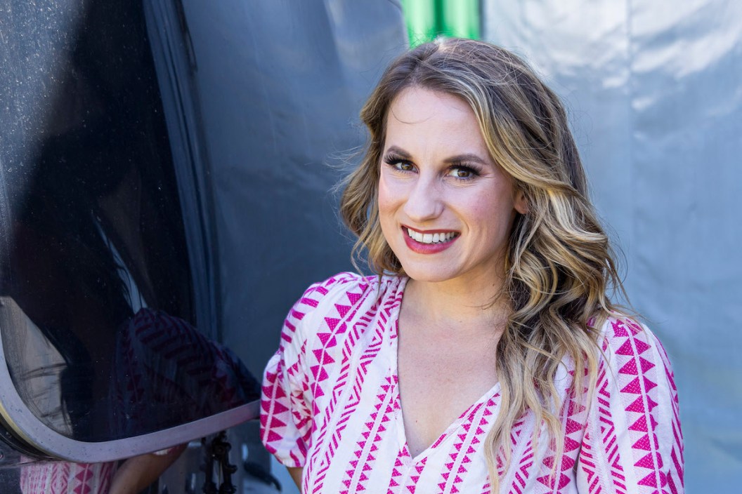 BROOKLYN, MICHIGAN - JULY 23: Caitlyn Smith poses backstage on day 2 of Faster Horses Festival 2022 at Michigan International Speedway on July 23, 2022 in Brooklyn, Michigan.