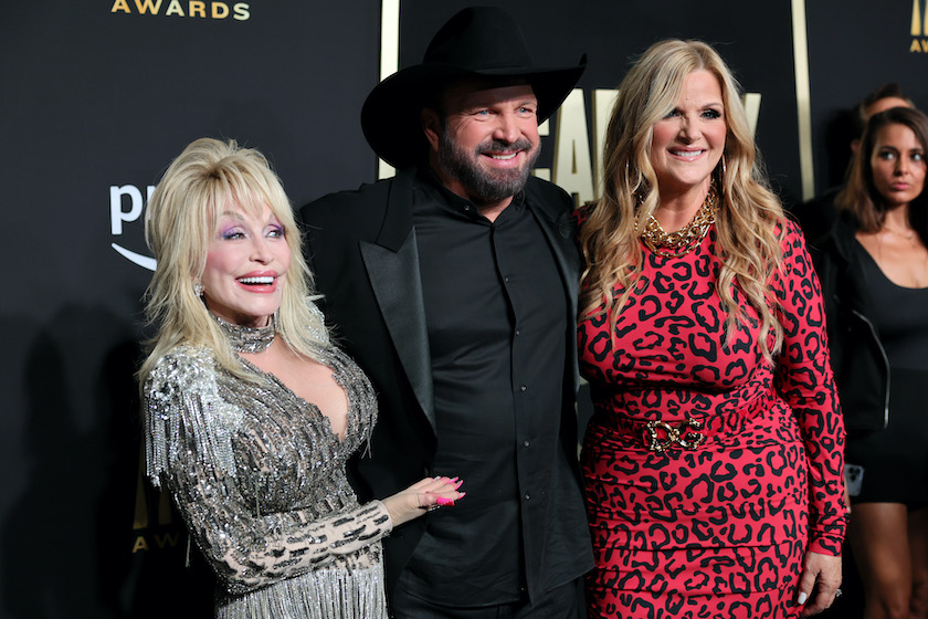 FRISCO, TEXAS - MAY 11: (L-R) Dolly Parton, Garth Brooks, and Trisha Yearwood attend the 58th Academy Of Country Music Awards at The Ford Center at The Star on May 11, 2023 in Frisco, Texas. 