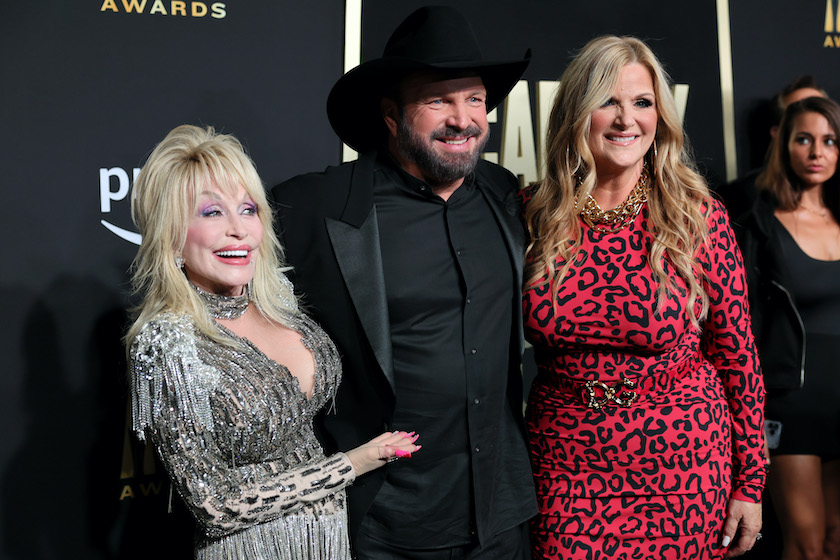 FRISCO, TEXAS - MAY 11: (L-R) Dolly Parton, Garth Brooks, and Trisha Yearwood attend the 58th Academy Of Country Music Awards at The Ford Center at The Star on May 11, 2023 in Frisco, Texas.
