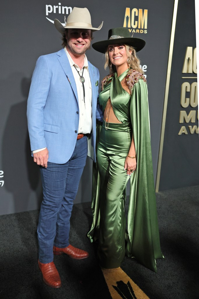 FRISCO, TEXAS - MAY 11: (L-R) Guest and Lainey Wilson attend the 58th Academy Of Country Music Awards at The Ford Center at The Star on May 11, 2023 in Frisco, Texas.