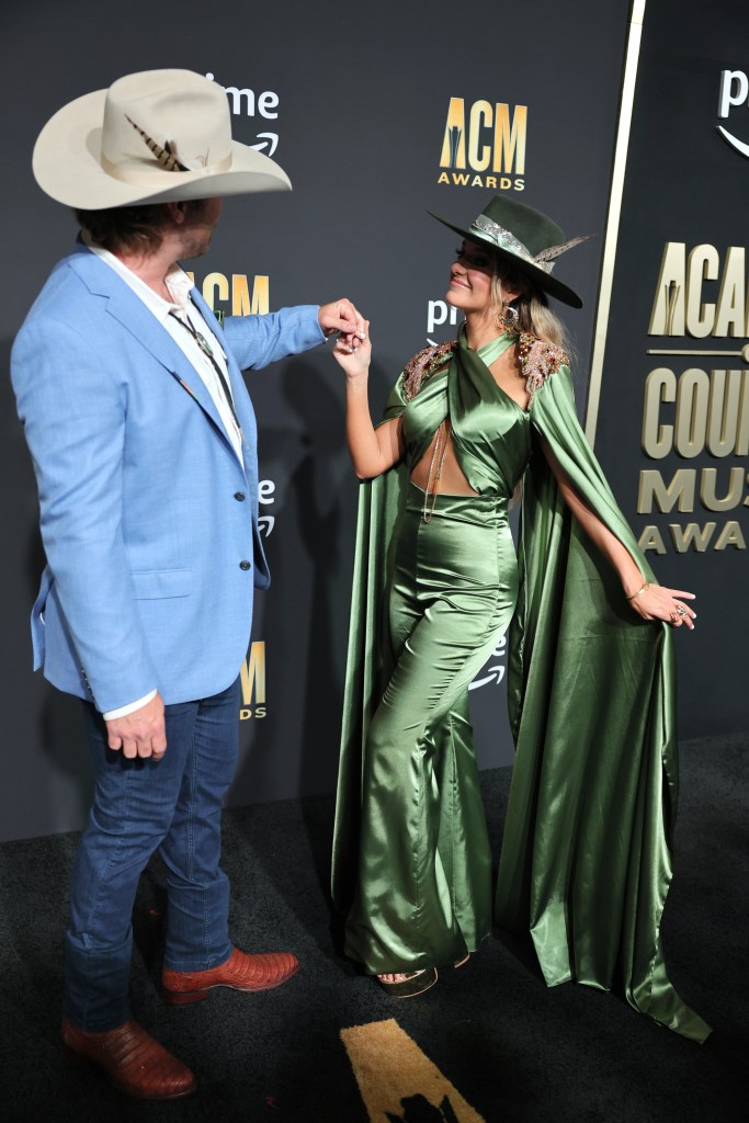 FRISCO, TEXAS - MAY 11: (L-R) Guest and Lainey Wilson attend the 58th Academy Of Country Music Awards at The Ford Center at The Star on May 11, 2023 in Frisco, Texas. 