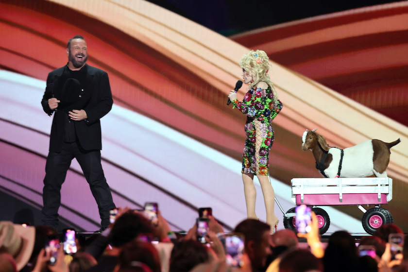 FRISCO, TEXAS - MAY 11: (L-R) Co-host Garth Brooks and Dolly Parton speak onstage during the 58th Academy Of Country Music Awards at The Ford Center at The Star on May 11, 2023 in Frisco, Texas. 