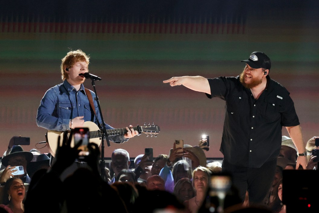 FRISCO, TEXAS - MAY 11: (L-R) Ed Sheeran and Luke Combs perform onstage during the 58th Academy Of Country Music Awards at The Ford Center at The Star on May 11, 2023 in Frisco, Texas.
