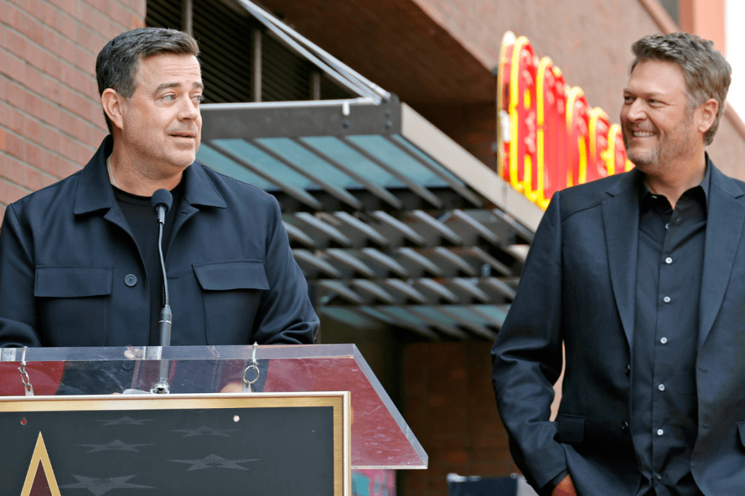 (L-R) Carson Daly and Blake Shelton speak on stage at Blake Shelton's Star Ceremony on The Hollywood Walk Of Fame on May 12, 2023 in Hollywood, California.