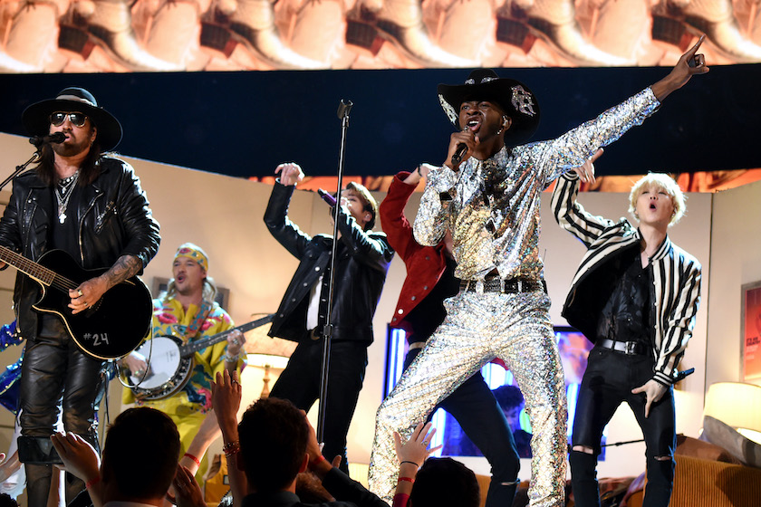 LOS ANGELES, CALIFORNIA - JANUARY 26: Billy Ray Cyrus, Lil Nas X, and BTS perform at the 62nd Annual GRAMMY Awards on January 26, 2020 in Los Angeles, California.