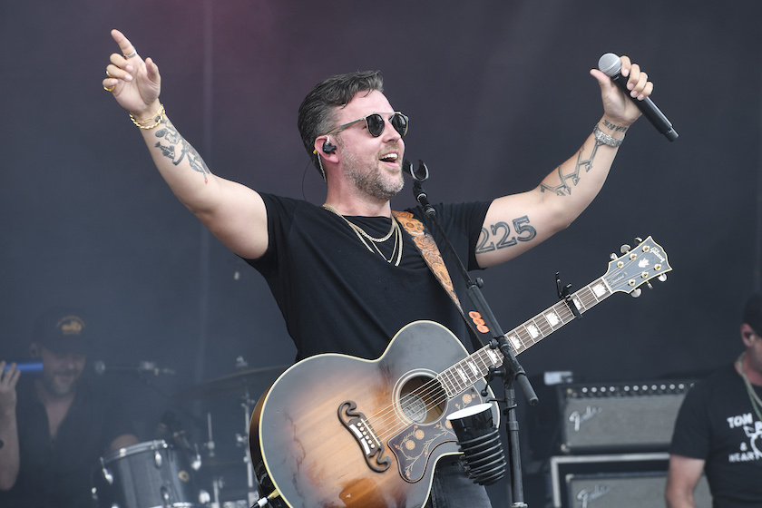 MADISON, IL - JUNE 04: T.J. Osborne, lead singer for the Brothers Osborne, performs during the Confluence Music Festival before the NASCAR Cup Series Enjoy Illinois 300 on June 4, 2023, at World Wide Technology Raceway at Gateway in Madison, Illinois. 