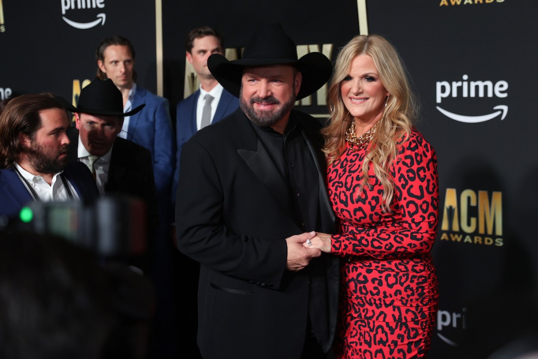 FRISCO, TEXAS - MAY 11: (L-R)) Garth Brooks and his wife Trisha Yearwood pose for picture during the 58th Academy of Country Music awards at The Ford Center at The Star on May 11, 2023 in Frisco, Texas.