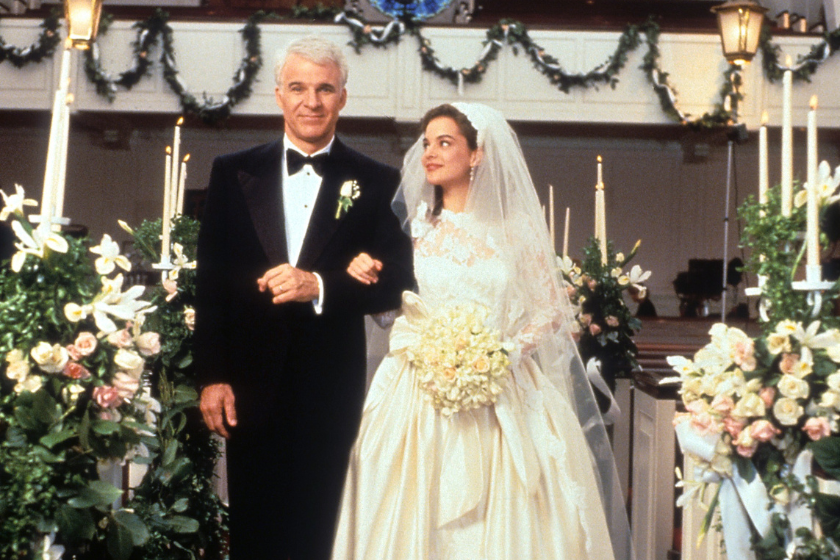 Steve Martin walking down the aisle with Kimberly Williams-Paisley in a scene from the film 'Father Of The Bride', 1991