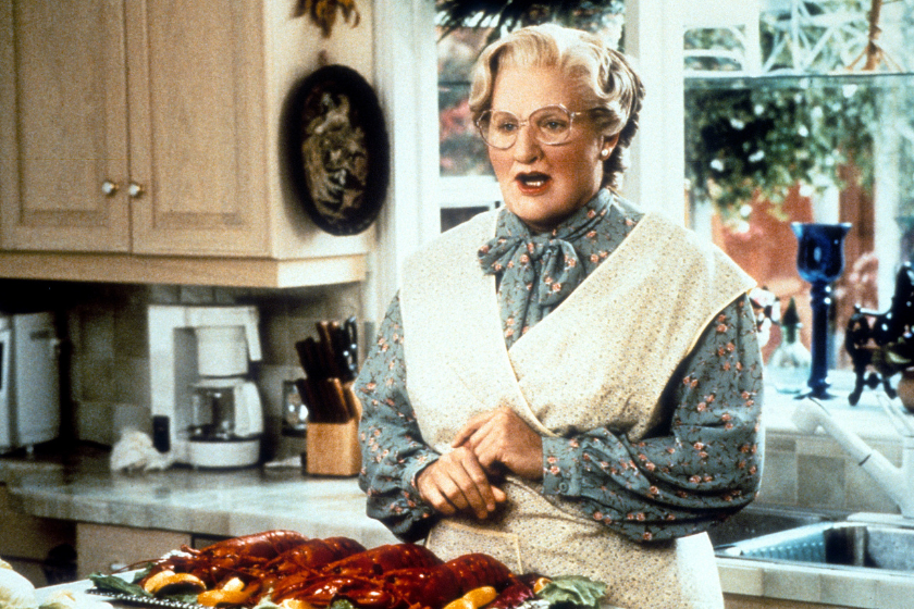 Robin Williams in the kitchen in a scene from the film 'Mrs. Doubtfire', 1993