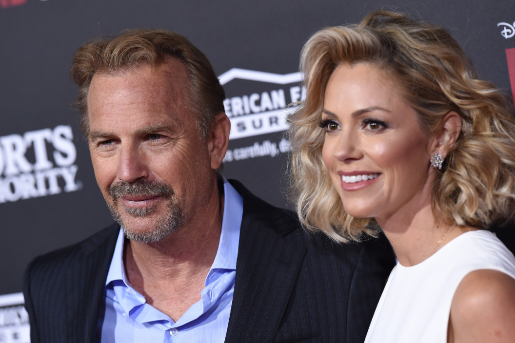 Actor Kevin Costner and wife Christine Baumgartner arrive at the World Premiere of Disney's 'McFarland, USA' at the El Capitan Theatre on February 9, 2015 in Hollywood, California.