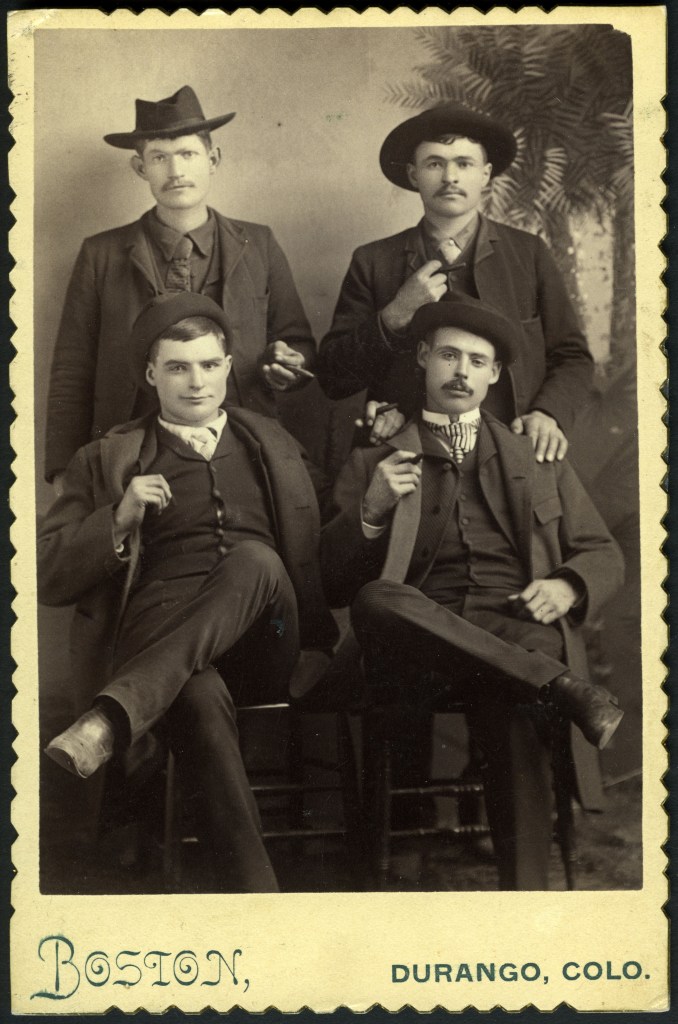 Cabinet card photograph of four men with a look of enforcers, shot late 1880s in Durango, Colorado. 
