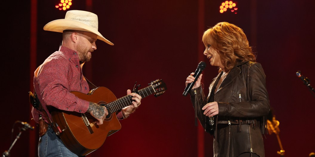 NASHVILLE, TENNESSEE - JUNE 09: (L-R) Cody Johnson and Reba McEntire perform on stage during day two of CMA Fest 2023 at Nissan Stadium on June 09, 2023 in Nashville, Tennessee.