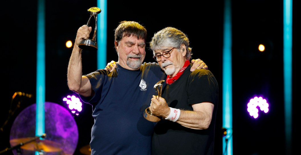 NASHVILLE, TENNESSEE - JUNE 11: (L-R) Teddy Gentry and Randy Owen of Alabama receive the Pinnacle Award during day four of CMA Fest 2023 at Nissan Stadium on June 11, 2023 in Nashville, Tennessee.