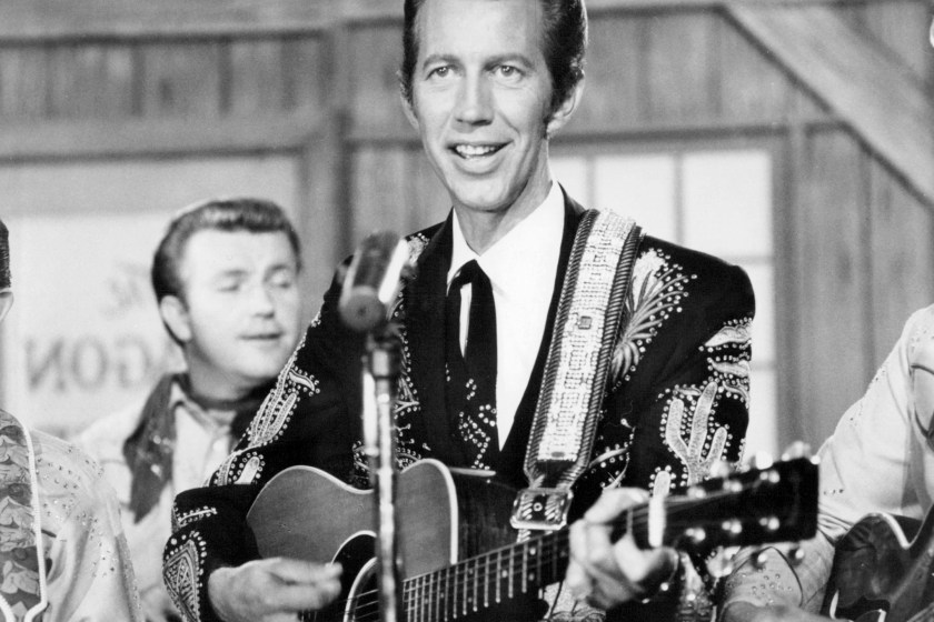 American country music singer Porter Wagoner (1927 - 2007) performing, circa 1960.