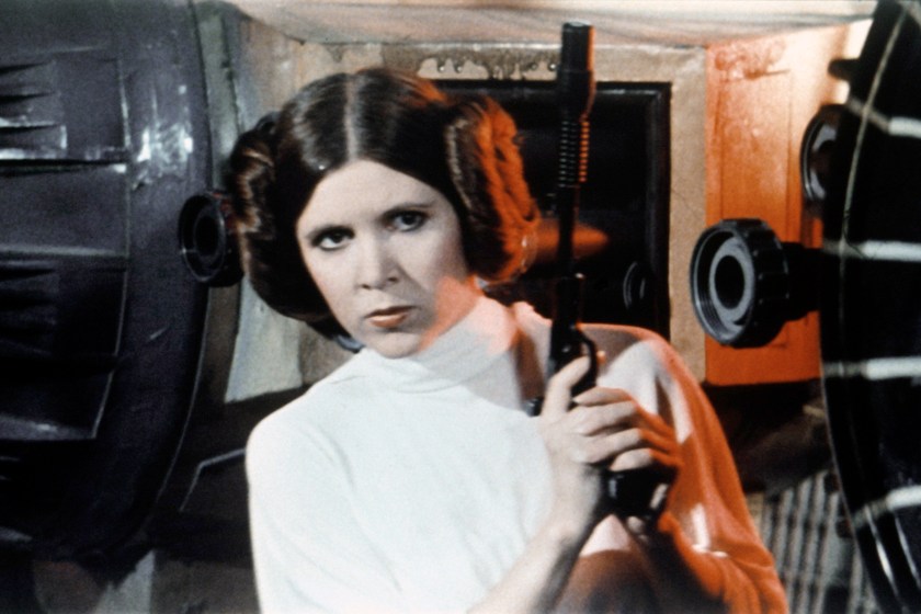 American actress Carrie Fisher on the set of Star Wars: Episode IV - A New Hope written, directed and produced by Georges Lucas.