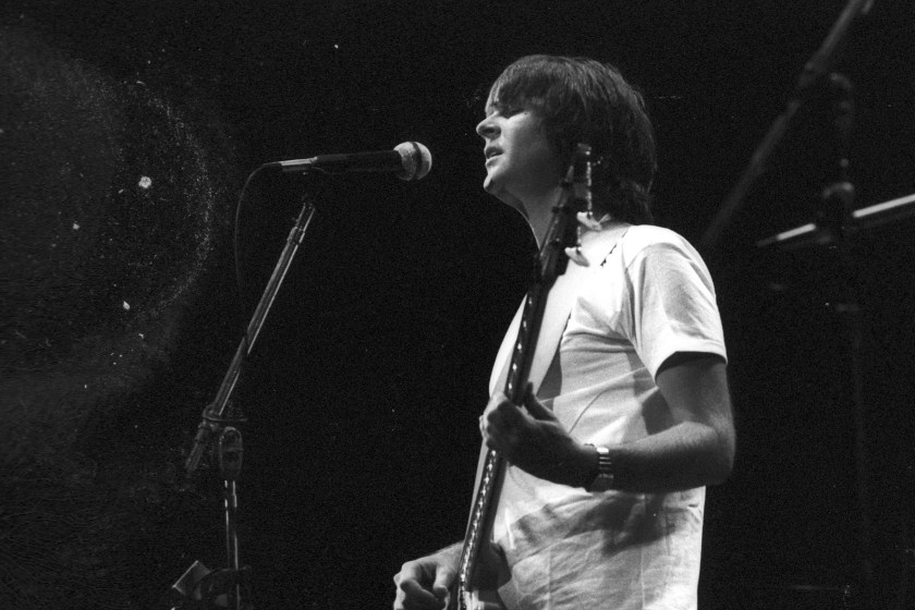Randy Meisner of the rock band 'Eagles' performs onstage with an acoustic guitar at the Omni Theatre on June 20, 1977 in Atlanta, Georgia.