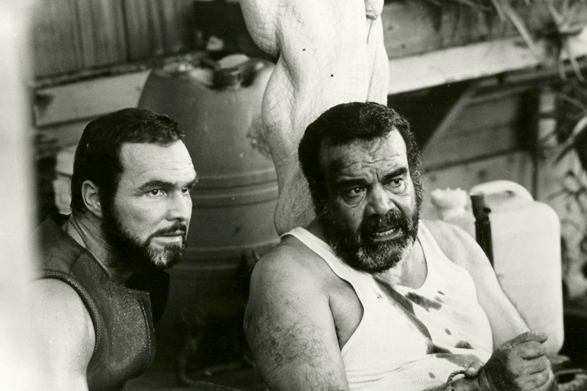 Burt Reynolds and David Reynoso in Stick (1985)