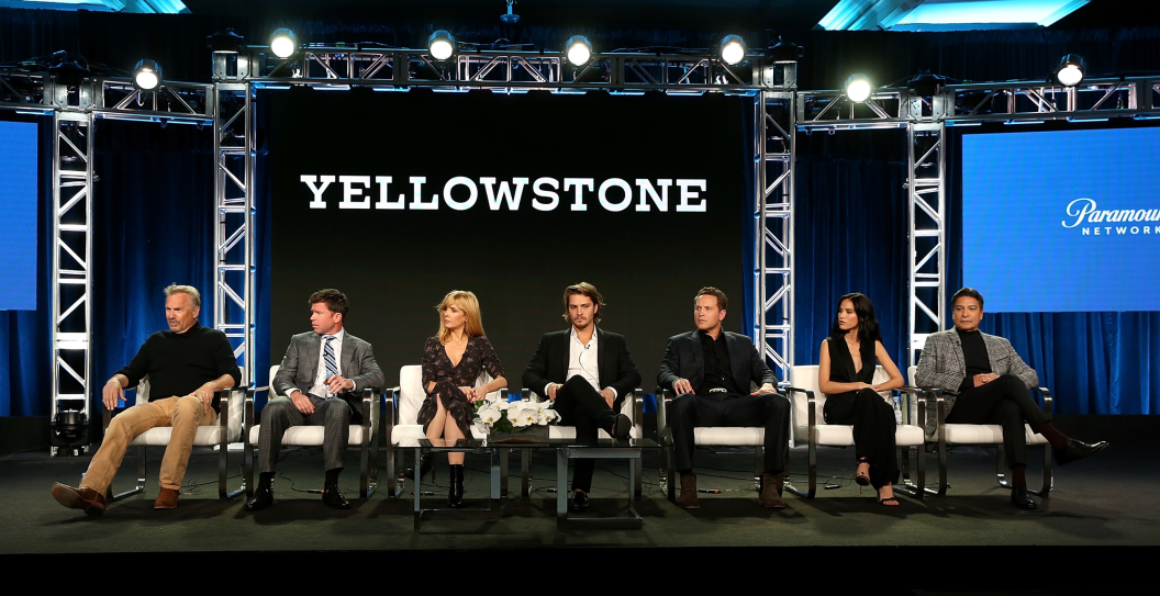 Actor Kevin Costner, producer/writer Taylor Sheridan, and actors Kelly Reilly, Luke Grimes, Cole Hauser, Kelsey Asbille, and Gil Birmingham of 'Yellowstone' speak onstage during the Paramount Network portion of the 2018 Winter TCA on January 15, 2018 in Pasadena, California