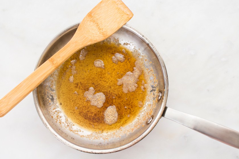 Freshly melted butter in a skillet