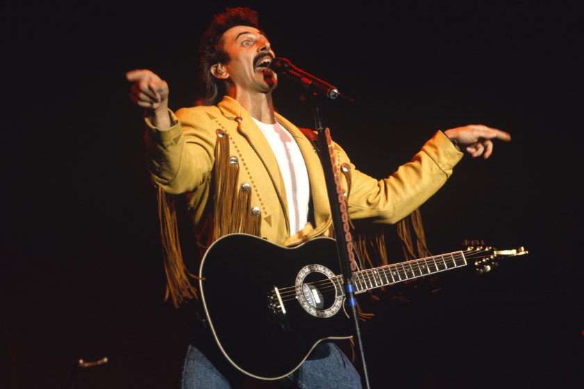 Aaron Tippin performs at Shoreline Amphitheatre on September 21, 1992 in Mountain View, California.