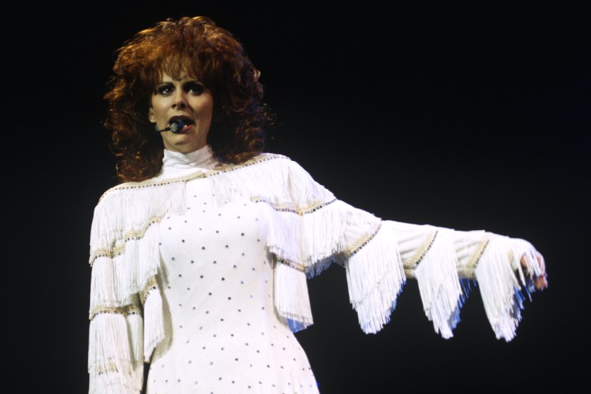 Reba McEntire performs at San Jose Arena on November 23, 1994 in San Jose, California.