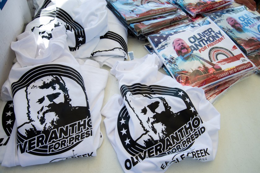 Oliver Anthony merchandise at the Oliver Anthony concert at the Eagle Creek Golf Club on August 19, 2023 in Moyock, North Carolina