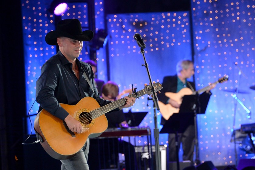 NASHVILLE, TN - NOVEMBER 05: Kenny Chesney performs onstage during the 61st annual BMI Country Awards on November 5, 2013 in Nashville, Tennessee. 