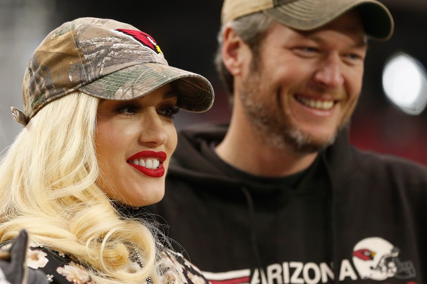 GLENDALE, AZ - DECEMBER 27: Musicians Gwen Stefani and Blake Shelton attend the NFL game between the Green Bay Packers and Arizona Cardinals at the University of Phoenix Stadium on December 27, 2015 in Glendale, Arizona. 