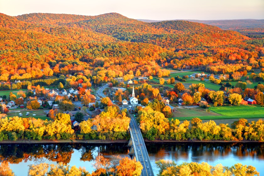 Connecticut River winding through the Poineer valley region of Massachusetts. Photo taken from a scenic viewpoint on Sugurloaf Mountain in Sunderland at dusk. The Pioneer Valley is known for its scenery and as a vacation destination and its beautiful fall foliage ranks with the best in New England