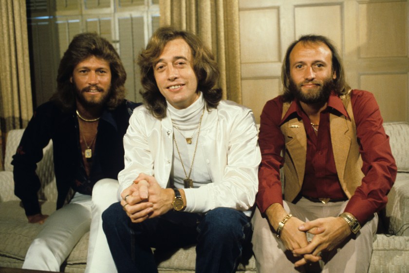 The popular disco band, The Bee Gees, pose for a portrait. 