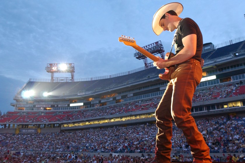 NASHVILLE, TN - JUNE 13: Brad Paisley performs June 13, 2002 at the 31st Annual Fan Fair in Nashville, Tennessee. The four-day event is billed as the world's largest country music festival and features concerts, fan club parties and opportunities to meet the stars. 