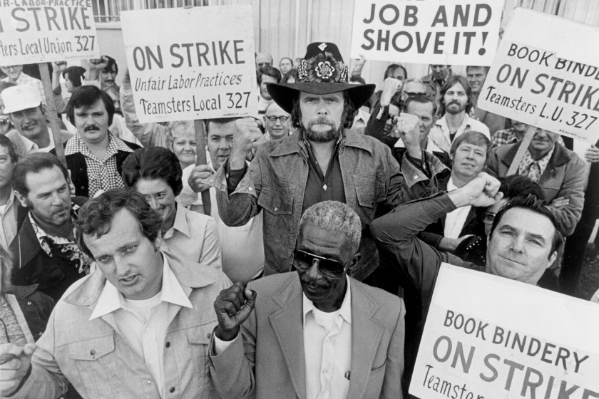 UNSPECIFIED - CIRCA 1970: Photo of Johnny Paycheck at a demonstration.